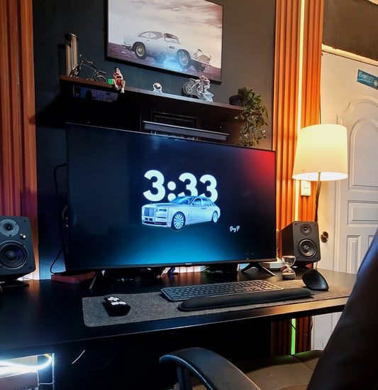 Hisense 43 inch 4K TV used as a monitor in a desk setup.